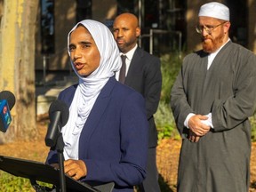 Aasiyah Khan of the National Council of Canadian Muslims speaks to reporters on Monday, Sept. 5, 2023 outside the Windsor courthouse at the beginning of the murder trial of Londoner Nathaniel Veltman in the killings of four members of the Afzaal family. (Mike Hensen/The London Free Press)