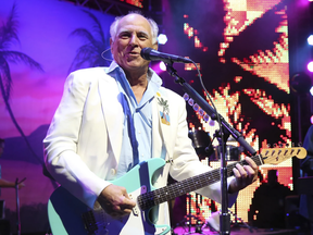 Jimmy Buffett performs at the after party for the premiere of “Jurassic World” in Los Angeles, on June 9, 2015.