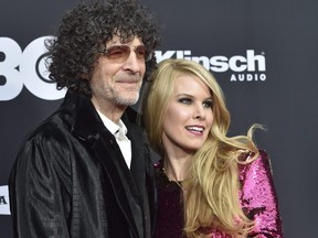 Howard Stern and his wife, Beth, arrive at the red carpet before the Rock and Roll Hall of Fame induction ceremony, Saturday, April 14, 2018, in Cleveland.