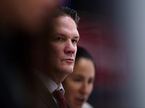 Head Coach Troy Ryan of Canada looks on during the IIHF World Championship Woman's ice hockey match between Canada and Sweden in Herning, Denmark, Thursday, Sept. 1, 2022.