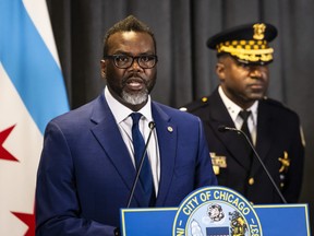 Chief Larry Snelling looks on as Mayor Brandon Johnson speaks during a news conference at City Hall to announce Snelling will be the next superintendent of the Chicago Police Department, Monday, Aug. 14, 2023 in Chicago. (Ashlee Rezin /Chicago Sun-Times via AP)