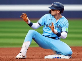 Blue Jays baserunner Cavan Biggio celebrates a double in the second inning against the Nationals at Rogers Centre in Toronto, Wednesday, Aug. 30, 2023.