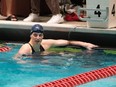 University of Pennsylvania swimmer Lia Thomas looks on after winning the 200 yard freestyle during the 2022 Ivy League Women's Swimming and Diving Championships at Blodgett Pool on February 18, 2022 in Cambridge, Massachusetts.