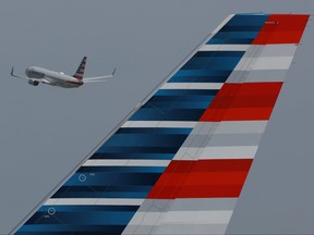 An American Airlines plane takes off from the Miami International Airport on July 20, 2023 in Miami, Florida.