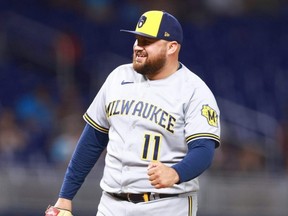 Brewers first baseman Rowdy Tellez reacts after throwing a strike during the ninth inning of the game against the Marlins at loanDepot Park in Miami, Friday, Sept. 22, 2023.