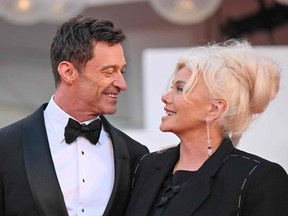 Australian actor Hugh Jackman and his wife Australian director Deborra-Lee Furness arrive on September 7, 2022 for the screening of the film "The Son" presented in the Venezia 79 competition as part of the 79th Venice International Film Festival at Lido di Venezia in Venice, Italy.