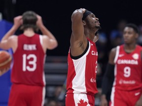 Canada guard Shai Gilgeous-Alexander reacts after receiving a technical foul during a Basketball World Cup semifinal game against Serbia in Manila, Philippines, on Friday, Sept. 8, 2023.