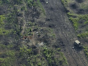 An aerial view near Bakhmut, the site of fierce battles with the Russian forces in the Donetsk region, Ukraine, Sunday, Sept. 3, 2023. Several aid organizations in Ukraine are reporting that a volunteer Canadian aid worker was killed Saturday morning by a Russian attack. In an Instagram post, humanitarian group Road to Relief says Anthony "Tonko" Ihnat was killed while travelling in a vehicle with three other volunteers with the organization.