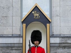 Ceremonial Guard Cpl. Yeomans of the Canadian Grenadier Guards regiment performs his Sentry Duties at Rideau Hall, in Ottawa on Friday, July 7, 2023.