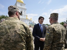 Prime Minister Justin Trudeau meets with soldiers in Kyiv, Ukraine, on Saturday, June 10, 2023.