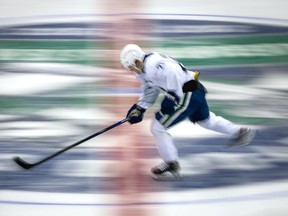 Vancouver Canucks' Nils Hoglander of Sweden skates during the NHL team's training camp in Abbotsford on Sept. 23, 2021.