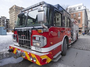 A Montreal fire department truck is seen Tuesday, March 21, 2023 in Montreal.&ampnbsp;Firefighters discovered the body of the man about 10:15 p.m. in the rubble of the building in the Montréal-Nord borough.