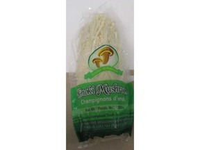 A package of Golden Mushroom brand Enoki mushrooms is pictured in this photo provided by the Canadian Food Inspection Agency.