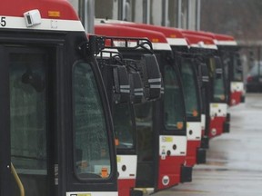 TTC buses wait to go into service at the Comstock TTC yards.