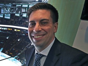 Calgary Flames assistant general manager Chris Snow, shown in a February 2020 photo, has passed away.