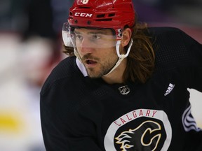 Flames' Chris Tanev skates during training camp at the Saddledome last month.