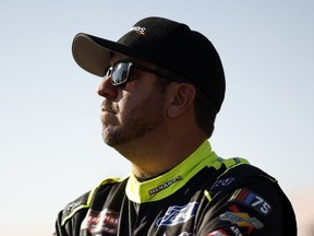 Matt Crafton, driver of the #88 Jack Links/Menards Ford, looks on during qualifying for the NASCAR Craftsman Truck Series Love's RV Stop 250 at Talladega Superspeedway on September 30, 2023 in Talladega, Alabama.