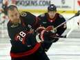 Senators forward Claude Giroux warms up before Saturday's game against the Flyers. Giroux was honoured before the contest for passing the 1,000-point mark late last season.