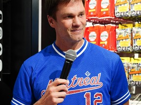 Tom Brady rocked a Montreal Expos jersey during a recent appearance at the MLB Store in New York.