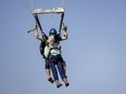 Dorothy Hoffner, 104, becomes the oldest person in the world to skydive with tandem jumper Derek Baxter on Sunday, Oct. 1, 2023, at Skydive Chicago in Ottawa, Ill.