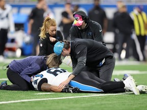 Medical personnel attend to Chandler Zavala of the Carolina Panthers after he was injured in the first quarter against the Detroit Lions at Ford Field on Oct. 8, 2023 in Detroit.