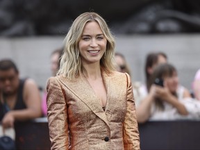 Emily Blunt poses for photographers at the photo call for the film 'Oppenheimer' on Wednesday, July 12, 2023 in London.