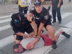 Screengrab from social media video of an arrest by Ottawa Police on Oct. 4, 2023.