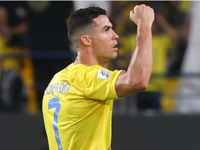 Nassr's Portuguese forward #07 Cristiano Ronaldo celebrates after scoring his team's first goal during the AFC Champions League group E football match between Saudi al-Nassr SC and Tajikistan's FC Istiklol at King Saud University Stadium in Riyadh on October 2, 2023.
