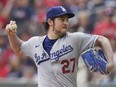 Los Angeles Dodgers pitcher Trevor Bauer (27) delivers against the Atlanta Braves on June 6, 2021, in Atlanta.