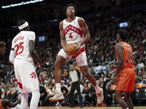 Toronto Raptors forward Scottie Barnes (4) jumps with the ball during first half exhibition basketball action against the Cairns Taipans of Australia, in Toronto, Sunday, Oct. 15, 2023.