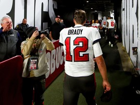 Tom Brady of the Tampa Bay Buccaneers walks off the field after losing to the Dallas Cowboys in the NFC Wild Card playoff game at Raymond James Stadium on January 16, 2023 in Tampa, Florida.