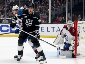 Pierre-Luc Dubois #80 of the Los Angeles Kings takes position in front of the net on Bowen Byram #4 and Alexandar Georgiev #40 of the Colorado Avalanche during the second period in the Los Angeles Kings season opening game at Crypto.com Arena on October 11, 2023 in Los Angeles, California.