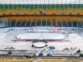 Crews work to put the final touches on the rink being used for the Heritage Classic game on Sunday between the Edmonton Oilers and the Calgary Flames. Taken on Friday, Oct. 27, 2023 in Edmonton. Greg Southam-Postmedia