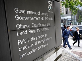 Tamara Lich, far right, and her lawyer, Lawrence Greenspon, are seen outside the Ottawa courthouse earlier this week.