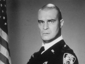 In this promotional handout file photo, actor Richard Moll is pictured as his character, bailiff Bull, in Night Court.