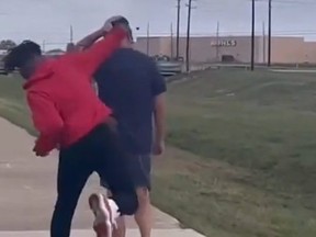 Screengrab of teen randomly punching man walking in Texas park.