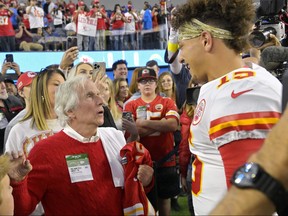 Actor Henry Winkler, left, speaks with Kansas City Chiefs quarterback Patrick Mahomes prior to an NFL football game between Chiefs and the Los Angeles Chargers in 2022.