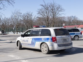 Montreal police vehicles are shown in this Friday, March 19, 2021, file photo.