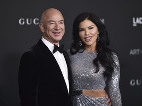 Jeff Bezos and Lauren Sanchez arrive at the LACMA Art + Film Gala on Saturday, Nov. 6, 2021, at the Los Angeles County Museum of Art.