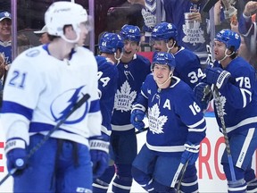 Toronto Maple Leafs right-winger Mitchell Marner (16) celebrates with teammates after scoring against Tampa Bay Lightning during third period NHL hockey action in Toronto on Monday Nov. 6, 2023.
