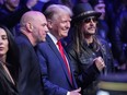 UFC president Dana White, second from left, and Kid Rock, right, pose for photographs with former President Donald Trump at UFC 295 on Saturday, Nov. 11, 2023, in New York.