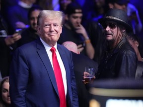 Former President Donald Trump stands with Kid Rock at UFC 295 Saturday, Nov. 11, 2023, in New York.