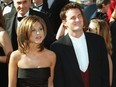 A Sept. 10, 1995 file photo shows Jennifer Aniston and Matthew Perry, co-stars in the comedy series "Friends," arriving at the 47th Annual Primetime Emmy Awards ceremony in Pasadena, Calif. Commenting on the hairstyle she wore in the first years of the series Anniston said "I think it was the ugliest haircut I've ever seen."