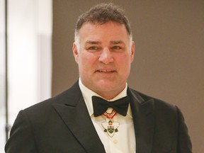 Hockey Hall of Famer Eric Lindros receives the Order of Ontario on Monday, Nov. 27, 2023, at a ceremony at the Royal Ontario Museum in Toronto with 25 other recipients. Lindros was honoured for his fundraising work with Easter Seals, contributing to the London Health Science Centre for orthopedic and sports medicine research and advocacy on concussion issues.