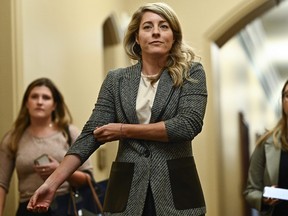 Minister of Foreign Affairs Melanie Joly arrives for a meeting of the federal cabinet on Parliament Hill in Ottawa on Tuesday, Oct. 3, 2023.