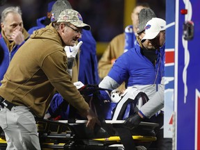 Taylor Rapp of the Buffalo Bills is transported into an ambulance after being injured in the second quarter against the New York Jets at Highmark Stadium on Nov. 19, 2023 in Orchard Park, N.Y.