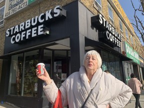 Vera Fischer enjoys her morning coffee from a Starbucks in Forest Hill, near Bathurst St. and Eglinton Ave. W., on Thursday, Nov. 16, 2023.