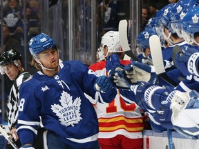 Maple Leafs forward William Nylander (left) celebrates his first period goal against the Flames at Scotiabank Arena in Toronto, Friday, Nov. 10, 2023.
