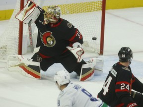 Ottawa Senators' Anton Forsberg lets a Vancouver Canuck goal in during second period action at Canadian Tire Centre on Thursday.