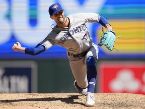 Toronto Blue Jays relief pitcher Adam Cimber delivers during the seventh inning of a baseball game against the Minnesota Twins, Saturday, May 27, 2023, in Minneapolis.